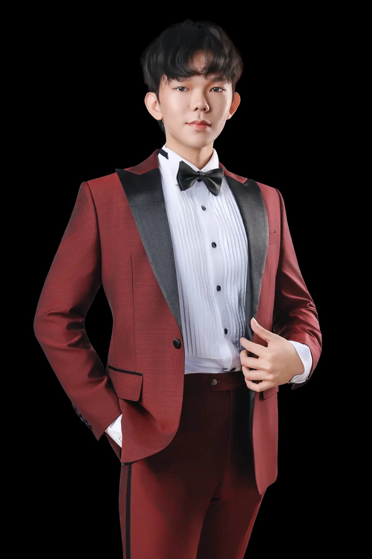 Formal headshot of Terence Poo in a burgundy tuxedo