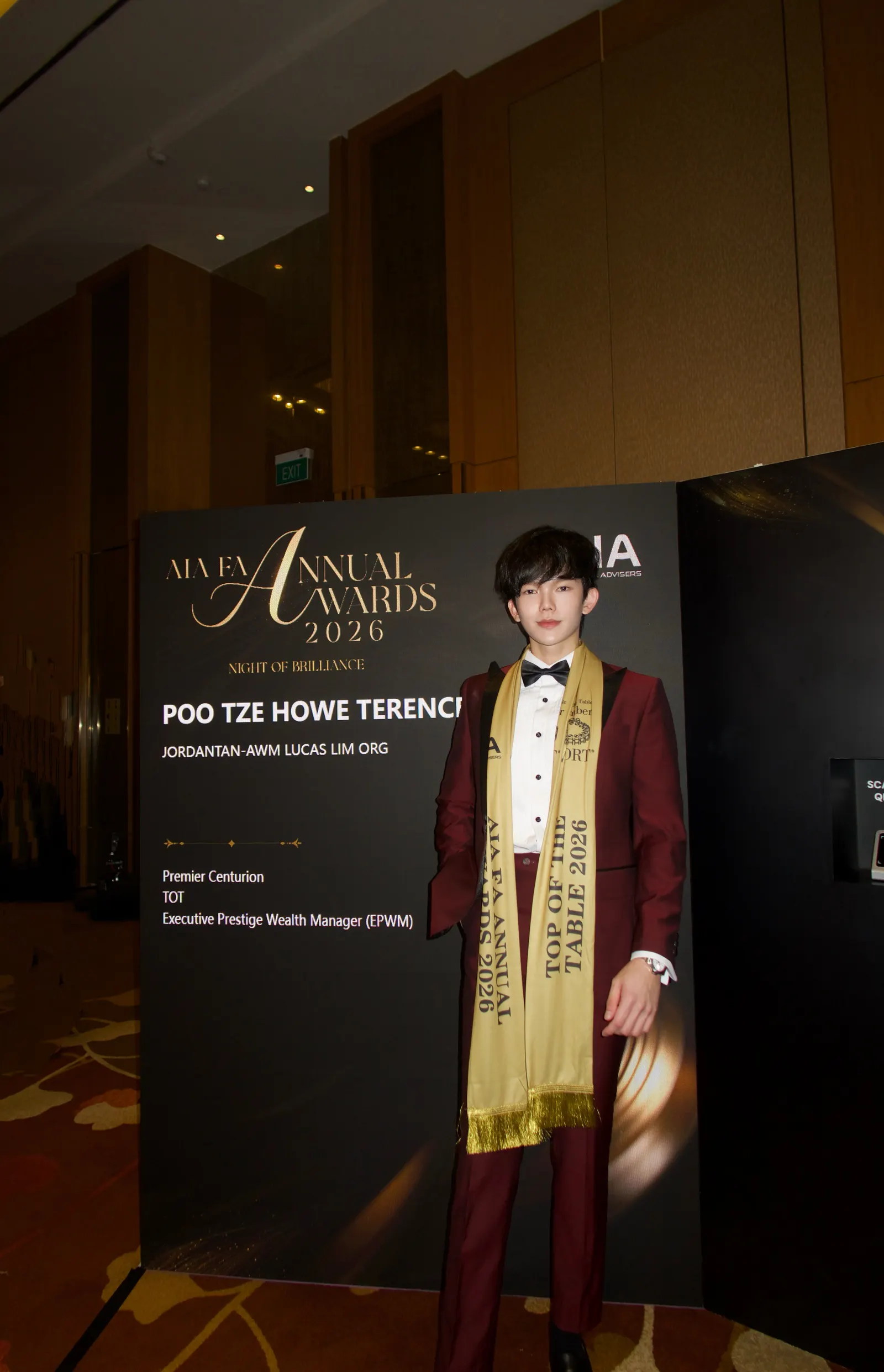 Terence Poo at the AIA FA Annual Awards 2026 with his Top of the Table sash